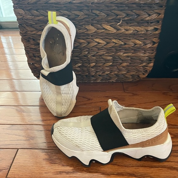 Sorel Shoes - Sorel White and black women’s kinetic impact strap sneaker